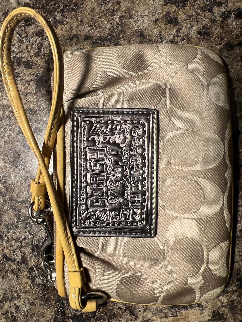 Coach Beige Signature Wristlet with Yellow Strap and Dark Logo Patch